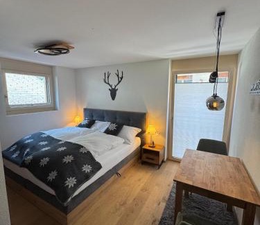 Busserach Apartamento | White Flake