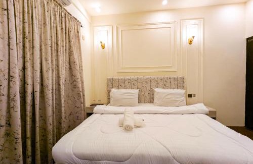 Karachi Cama Y Desayuno | White Rose BnB Family - Near Millennium Mall - Airport - National Stadium