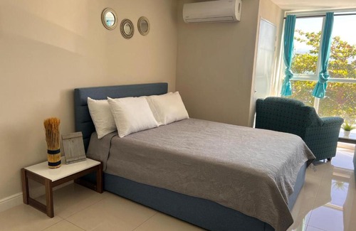 Portmore Apartamento | White waves 111