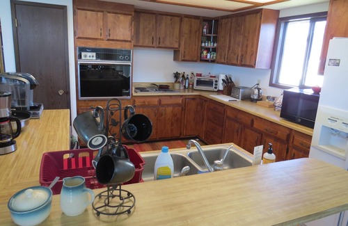 Kettle Falls Casa | Whole house with four bedrooms, laundry room, hot tub, living and dining room.
