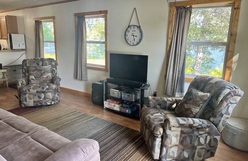 Rhinelander Cabaña | WI River-Boom Lake cottage on spacious lot, water on 3 sides, kayaks, fire pit