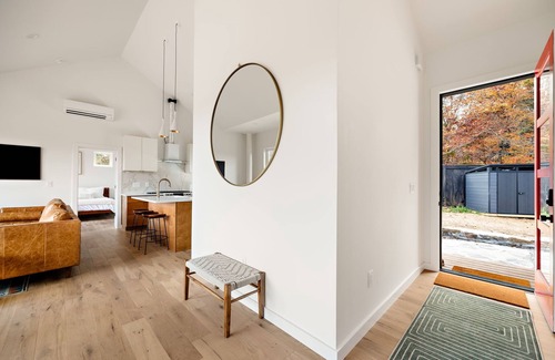 Young Harris Cabina | Wildcat Modern: Elegant mountain retreat with fire pit, deck, elevated furnishings, and pool and gym