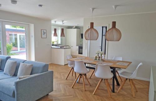 Norddeich Casa | Wilde Brise 3 – Luxusbungalow in bester Lage in Norddeich