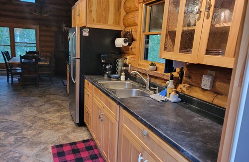 Isabella Cabina | Wilderness Log Home on the River Ely Lakes Fish Hike Ski Snowmobiling ATV Pets