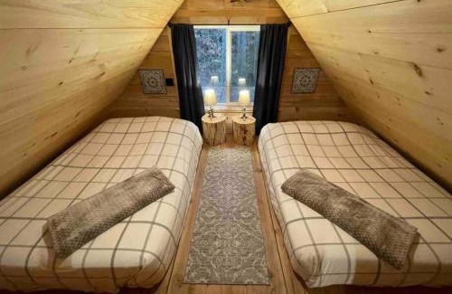 Regional District of Nanaimo Casa | Wind Down Log Cabin in the Woods with Cozy Woodstove