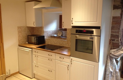 Quistinic Cabaña | Wisteria Cottage - Vine and Wisteria Cottages