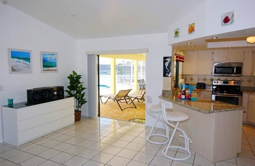 Fort Myers Villa | Gran vista, ubicada en un amplio canal, gran piscina y terraza, excelente ubicación
