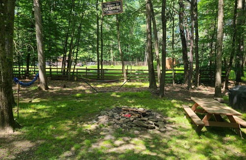 Paupack Casa | Wooded Retreat: 3 Bed/2 Bath, Hot Tub, A/C, Fire Pit, Ping Pong + Yard Games