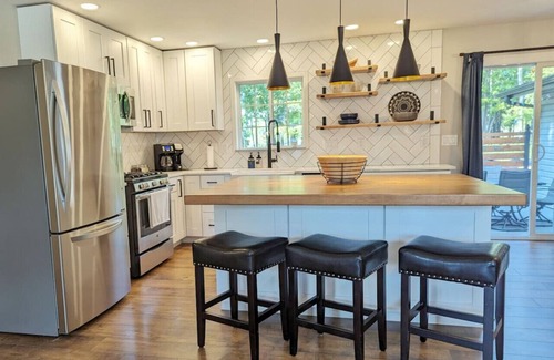 Wausau Casa | Wooded waterfront retreat with hot tub & fire pit