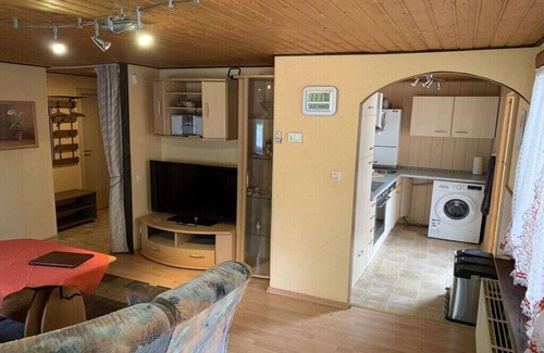 Waldsiedlung Romerstraße Casa | Wooden holiday home with winter garden