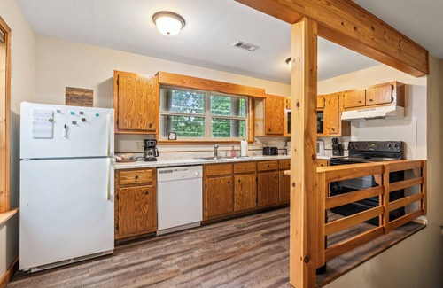 Kansas Casa | Woodland Escape, A rustic Charm meets Modern comfort in this 2BR 2BA home.