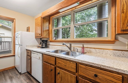 Kansas Casa | Woodland Escape, A rustic Charm meets Modern comfort in this 2BR 2BA home.