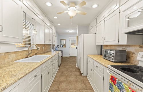 Fayetteville Casa | Woodland Wonderland, Downtown, Spacious, Brick Rancher