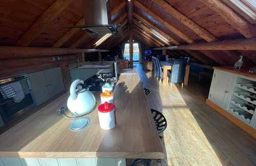 Tattershall Cabina | Woodpecker two storey log cabin with a pizza oven,bbq,hot tub, pool table, fishing peg@tattershall