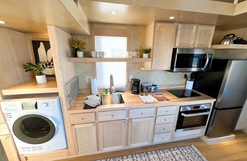 Pear Park Casa | XL tiny home with two lofted queen beds and full size futon on the main level.