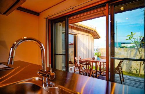 Minatogawa Villa | YACHIMUN Terrace ~シーサーが見守る小さな漁村の宿 ~