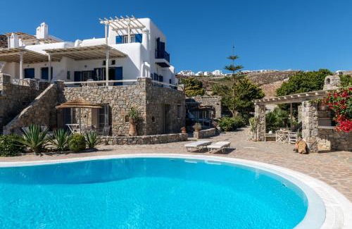 Kanalia Apartamento | Yalos Mykonos Ornos Pouli private apartments w shared swimming pool