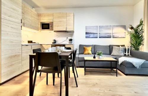 Nivy Apartamento | Yarn - brand new - free parking - balcony with city view - Central shopping mall