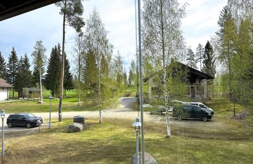 Tahkovuori Casa | Yläkerran asunto parvekkeella ja saunalla