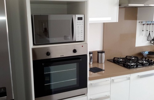 Roches Noires Apartamento | Su apartamento con vistas al mar