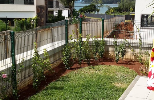 Roches Noires Apartamento | Su apartamento con vistas al mar