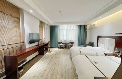 Qindu Qu Cama Y Desayuno | Yundu Business Hotel