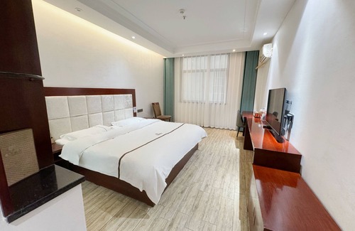 Qindu Qu Cama Y Desayuno | Yundu Business Hotel
