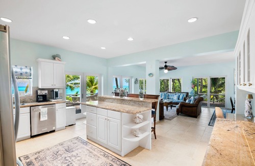 Tar Bay Villa | Zen Exuma: Stunning Beachfront Villa w/ NEW Rooftop Lounge, Spa, Cabana & Pool!