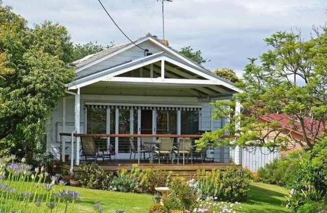 1950s Bayfront Classic With Glistening Water Views