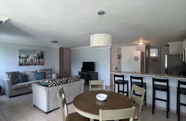 Garden condo, pool, close to beach and Rio Mar Hotel gulf course.