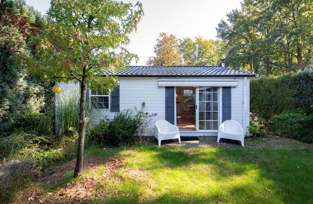 84, gelegen in het rustige & bosrijke Oisterwijk! Met privétuin