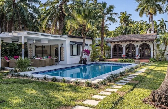 A Miracle Waterfront Villa In The Green in Miami!