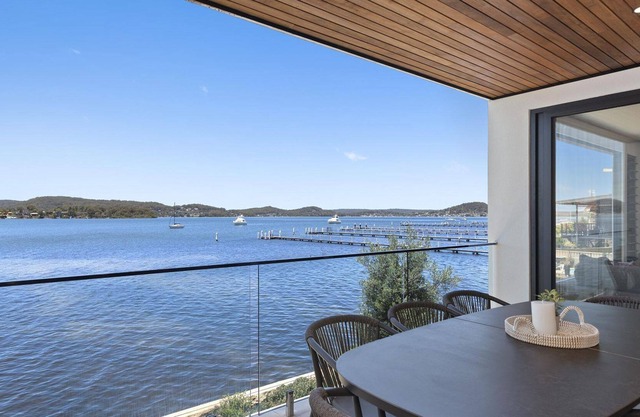 A Waterfront at Point Clare - Waterfront at Point Clare is the dream holiday house - absolute waterfront, private jetty, heated pool and stunning views from every level.