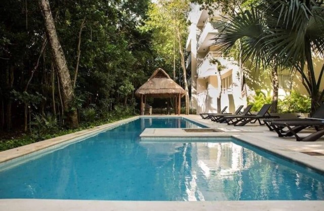 Adventurer’s 2BR Escape | Pool+BBQ + Walk to Beach