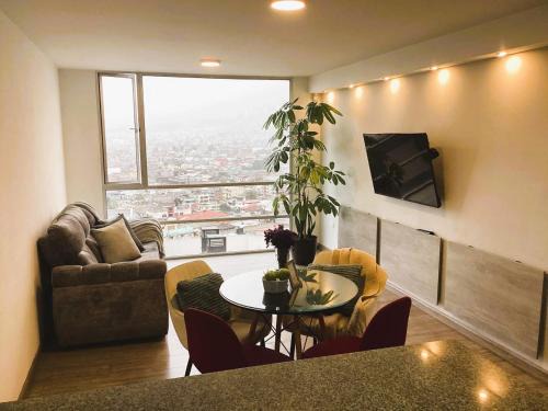 Apartamento cerca de Solca y Embajada, turismo, trabajo, gimnasio, con vista al Cotopaxi