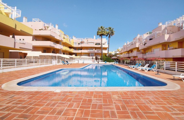 Apartamento 'Apartamento Royal Cabanas Golf' con piscina compartida, Wi-Fi y aire acondicionado.