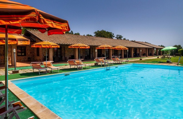Apartamento Casa Vacanza Il Carpignone 6 con vistas al lago, piscina compartida y jardín