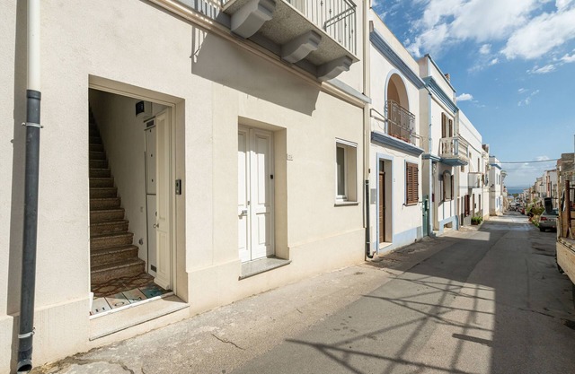 Apartamento 'Casa Vacanze Riflessi Sul Mare' con balcón, Wi-Fi y aire acondicionado