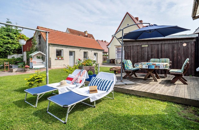 Apartamento 'Ferienwohnung Auf Der Insel Rügen' con terraza y jardín compartidos