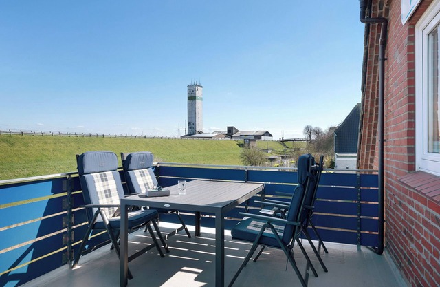 Apartamento 'Ferienwohnung Deichblick' con jardín compartido, balcón y Wi-Fi