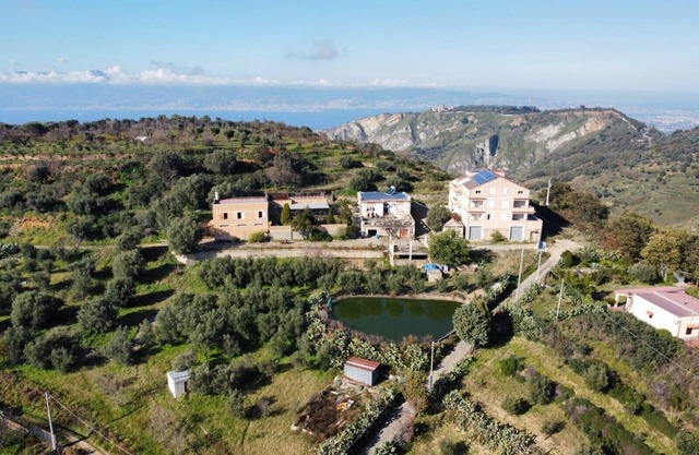 Apartamento en una casa rural 'Sant' Anna Ortì' con vistas al mar, jardín compartido y Wi-Fi