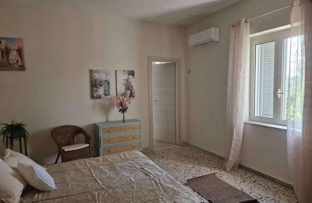 Apartamento 'L'Orchidea' con jardín privado, Wi-Fi y aire acondicionado