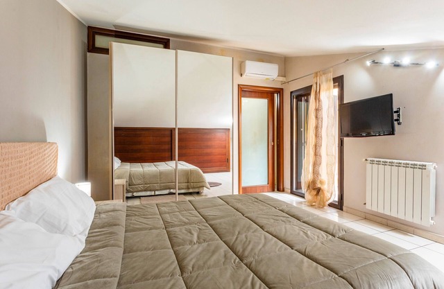 Apartamento 'Le Palme' con jardín compartido, Wi-Fi y aire acondicionado