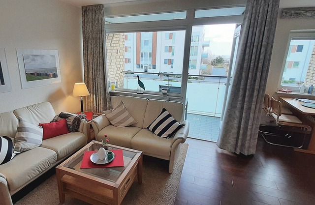 Apartment "Strandlust": Great apartment with sunbathing area on the lake and