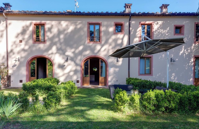 Apartamento 'Villa Leonardo - Belle Ferronière' con jardín compartido, Wi-Fi y aire acondicionado.