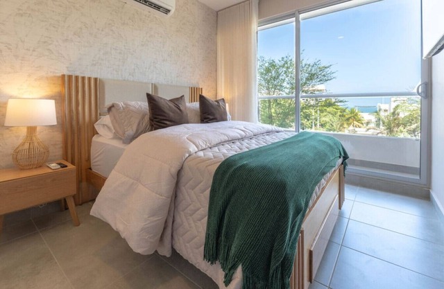 Apto con balcón privado piscina y playa