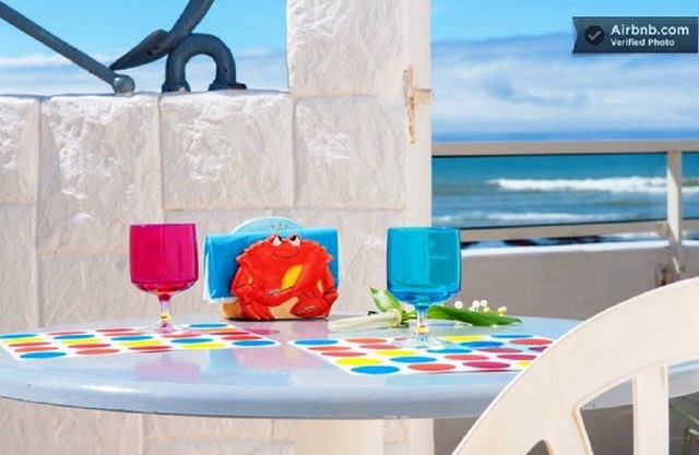 Frente a la playa Casa / ESTUDIO FRENTE AL MAR PARA ROMANCE 2.