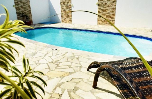 Casa en Itapoa con piscina, wifi y aire acondicionado