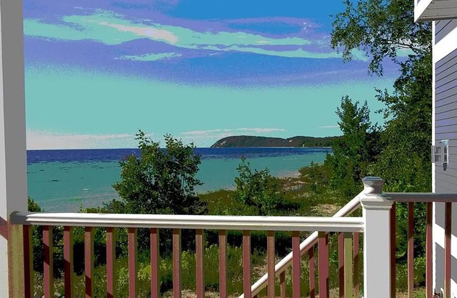 Directamente en el lago Mi ~ Vistas de las islas Manitou y la costa de Sleeping Bear