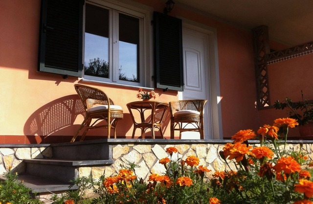Casa adosada, 3 dormitorios, dos baños, jardín, patio, WiFi gratis, aire acondicionado